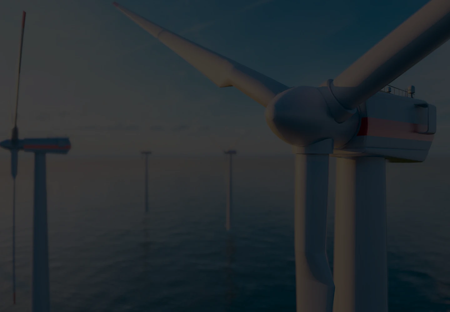 Fotografia aérea de cinco turbinas eólicas instaladas no mar.