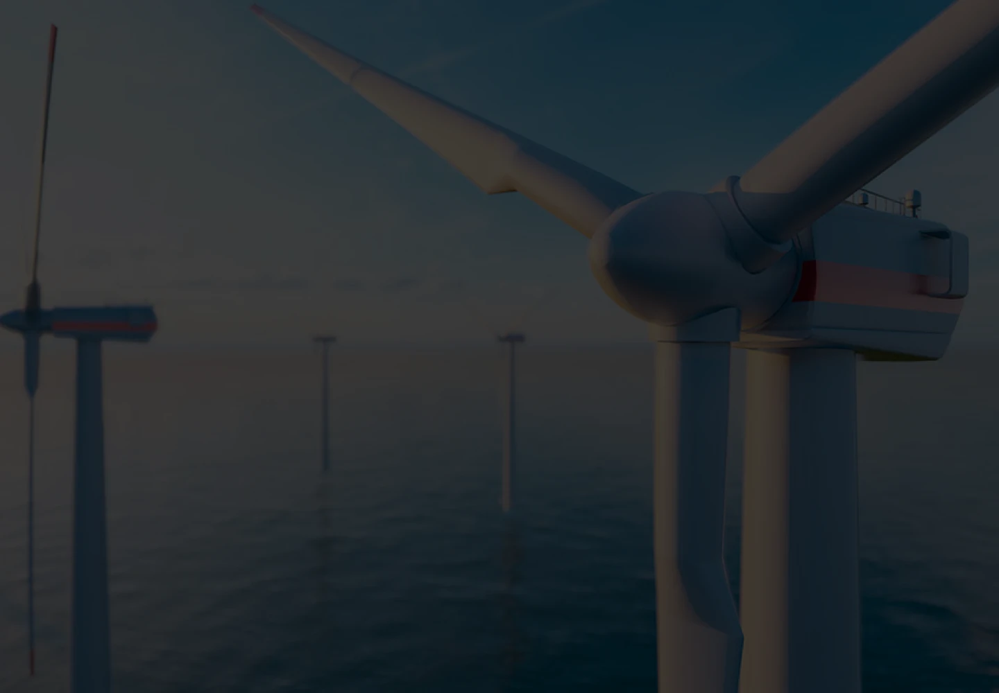 Aerial photo of five wind turbines installed at sea.