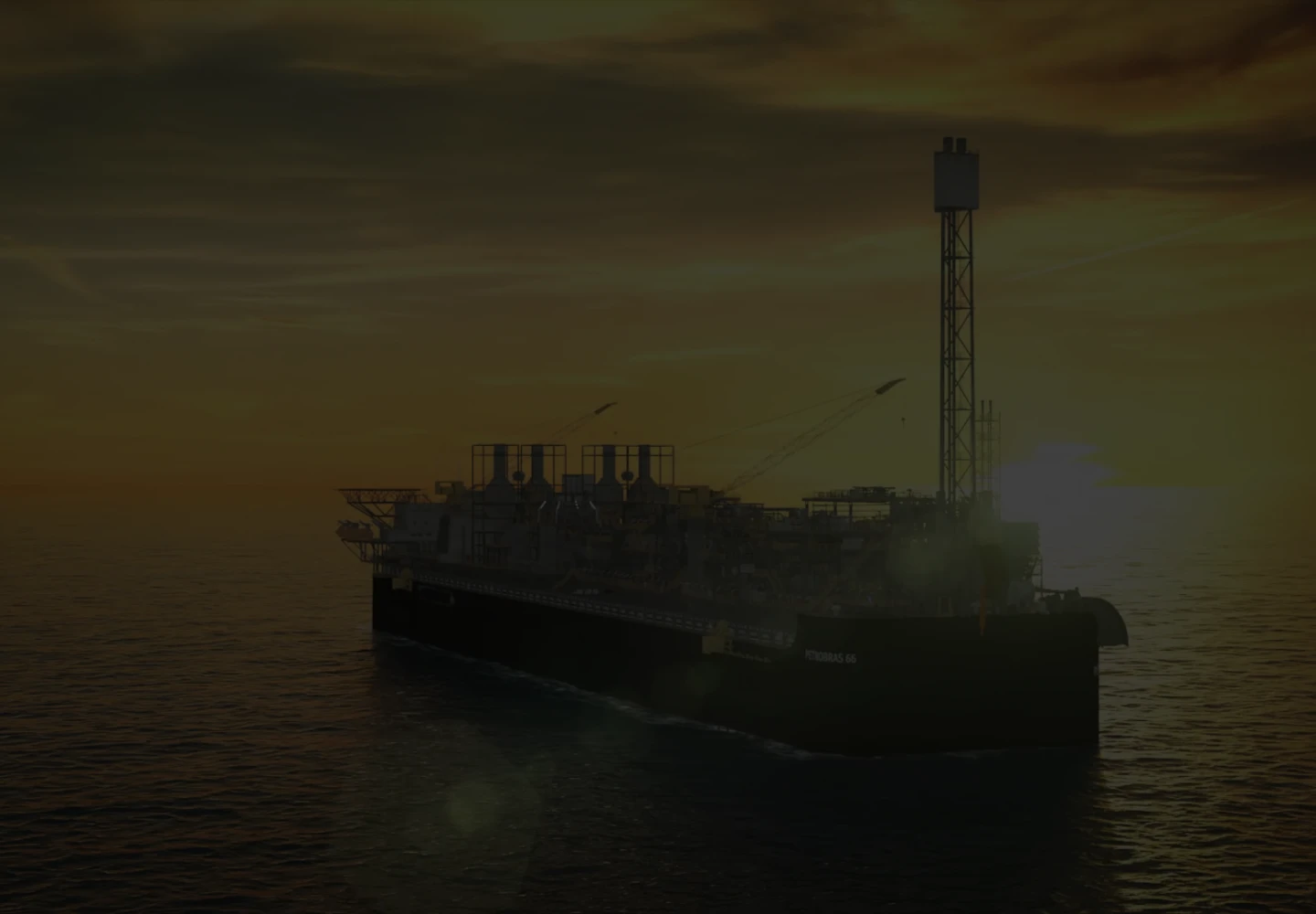 Photograph of a Petrobras FPSO platform during sunrise or sunset.